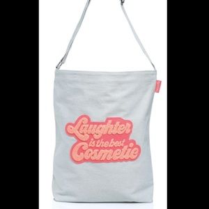 Benefit laughter is the best cosmetic tote
